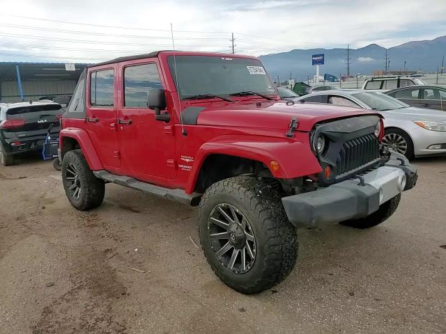 2011 Jeep Wrangler Unlimited Sahara VIN: 1J4BA5H14BL630180 Lot: 67254164