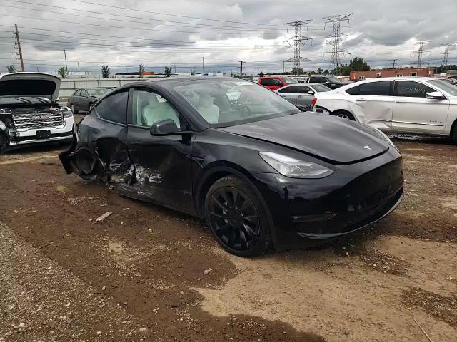 2023 Tesla Model Y VIN: 7SAYGDEE3PF810604 Lot: 69479954