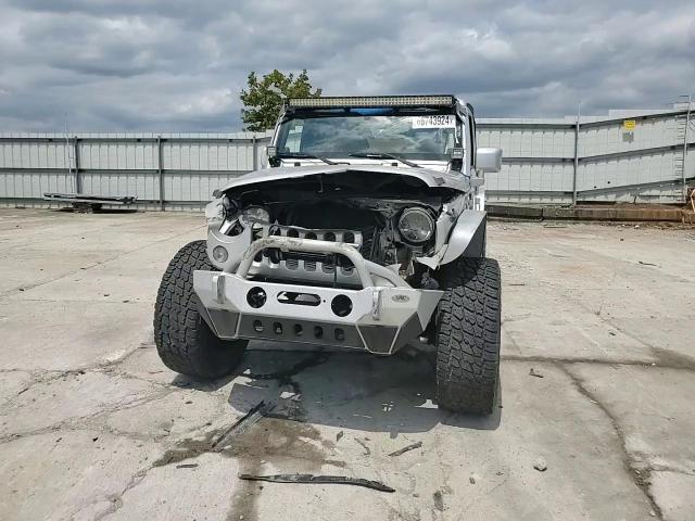 2010 Jeep Wrangler Unlimited Sahara VIN: 1J4HA5H17AL115067 Lot: 66743924