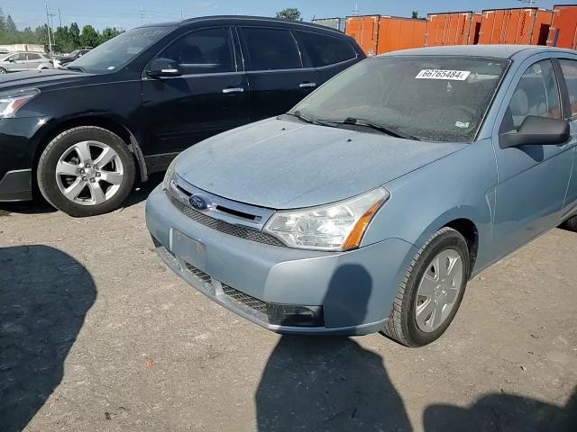 2009 Ford Focus S VIN: 1FAHP34NX9W171361 Lot: 66765484