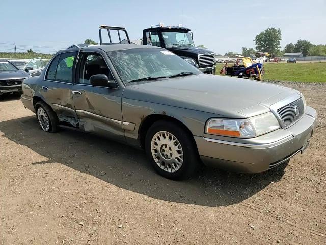 2003 Mercury Grand Marquis Gs VIN: 2MEFM74WX3X615956 Lot: 68770604