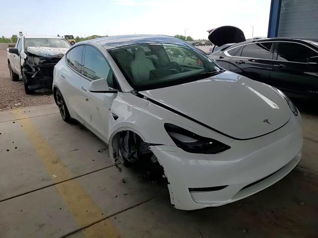 2023 Tesla Model Y VIN: 7SAYGDEE6PF858274 Lot: 65186354