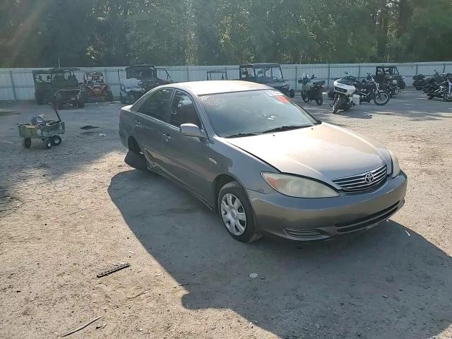 2004 Toyota Camry Le VIN: 4T1BE30K04U910450 Lot: 68621244