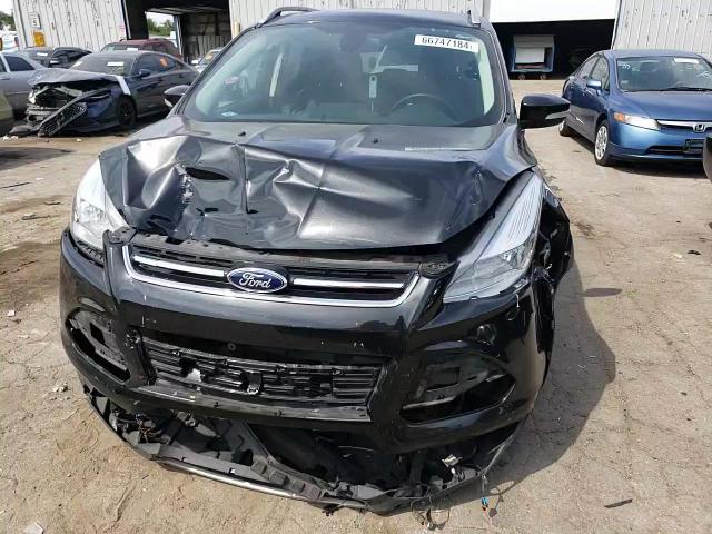 2015 Ford Escape Titanium VIN: 1FMCU0J98FUB16977 Lot: 68448204