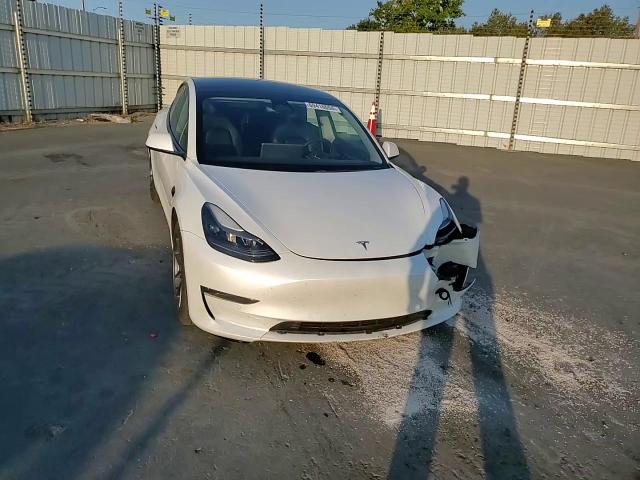 2022 Tesla Model 3 VIN: 5YJ3E1EA0NF197105 Lot: 69416094