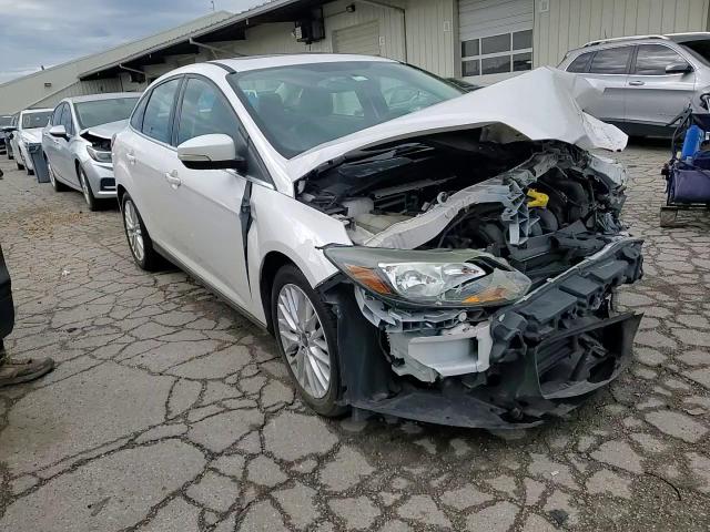 2013 Ford Focus Titanium VIN: 1FADP3J20DL208968 Lot: 69159384