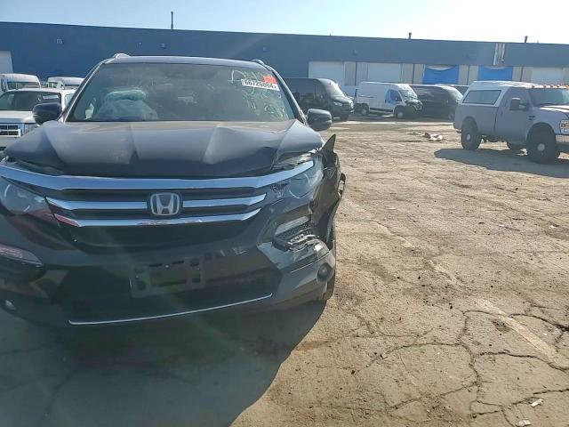 2017 Honda Pilot Touring VIN: 5FNYF6H9XHB501675 Lot: 66726804