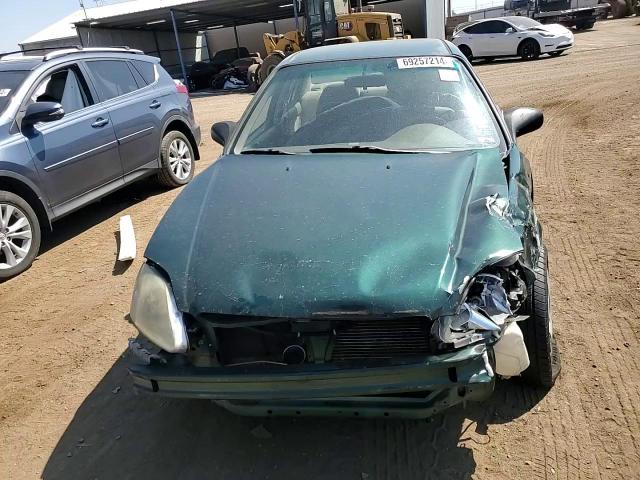 2000 Honda Civic Lx VIN: JHMEJ6674YS003007 Lot: 69257214