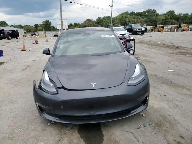 2021 Tesla Model 3 VIN: 5YJ3E1EBXMF049793 Lot: 69774214