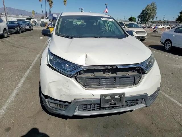 2019 Honda Cr-V Lx VIN: 2HKRW5H30KH416332 Lot: 67790014