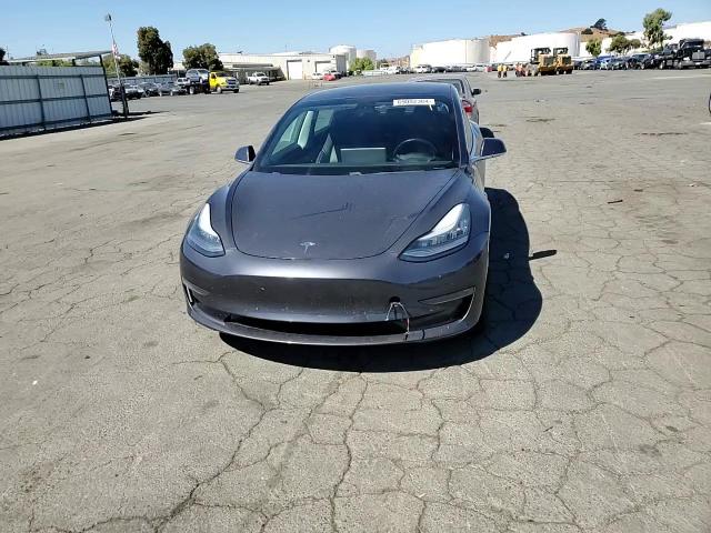 2019 Tesla Model 3 VIN: 5YJ3E1EA3KF311173 Lot: 69002384