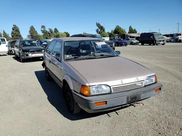 1989 Mazda 323 VIN: JM1BF2329K0392124 Lot: 68184144