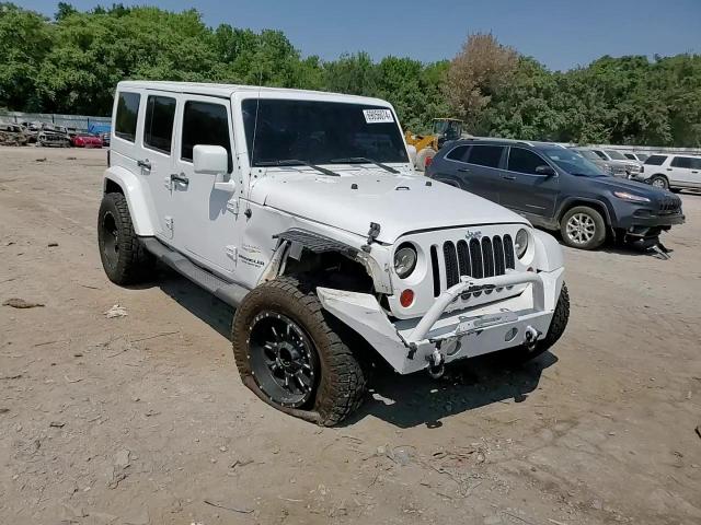 2011 Jeep Wrangler Unlimited Sahara VIN: 1J4HA5H17BL617658 Lot: 69056074