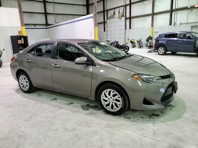 2018 Toyota Corolla L VIN: 5YFBURHEXJP773177 Lot: 65673874