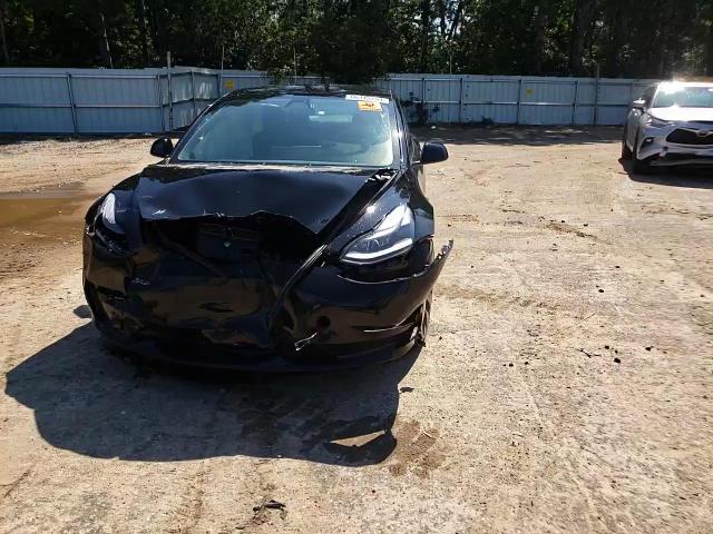 2021 Tesla Model 3 VIN: 5YJ3E1EC5MF056515 Lot: 66315754