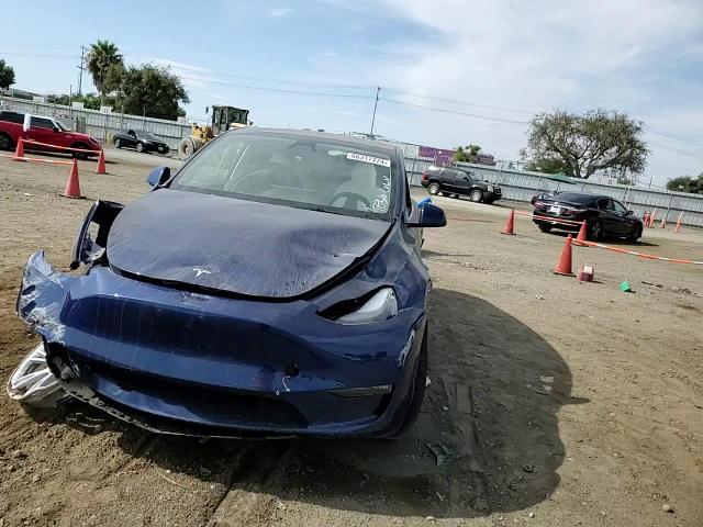 2023 Tesla Model Y VIN: 7SAYGDEE1PF802386 Lot: 66317474