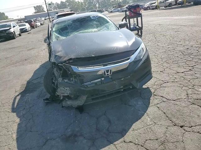 2018 Honda Civic Lx VIN: 2HGFC2F59JH557391 Lot: 69244364