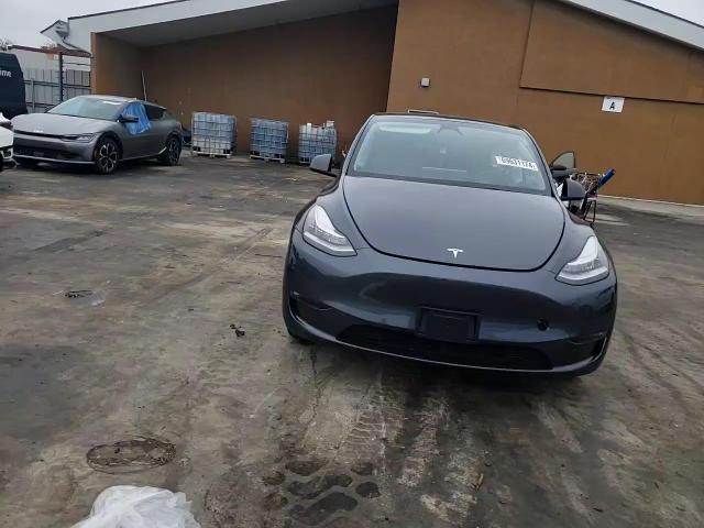 2022 Tesla Model Y VIN: 7SAYGAEE8NF570025 Lot: 69631174