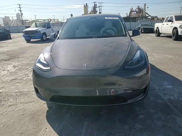 2023 Tesla Model Y VIN: 7SAYGDED0PF972097 Lot: 66129644