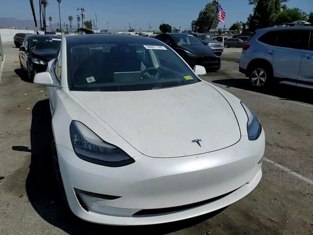 2019 Tesla Model 3 VIN: 5YJ3E1EAXKF328326 Lot: 68621144