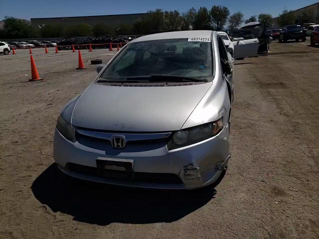 2007 Honda Civic Lx VIN: 1HGFA15537L143858 Lot: 68374574