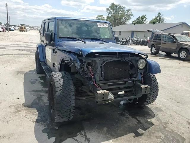 2009 Jeep Wrangler Unlimited Sahara VIN: 1J4GA59139L727062 Lot: 66534534