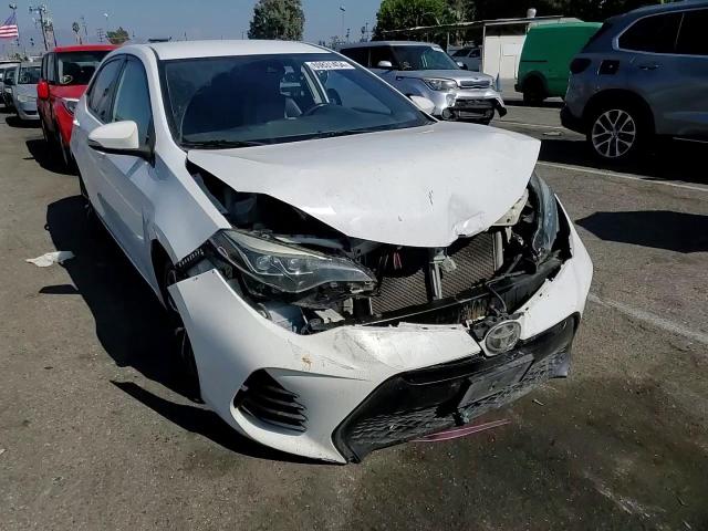 2017 Toyota Corolla L VIN: 5YFBURHE1HP691784 Lot: 69831454