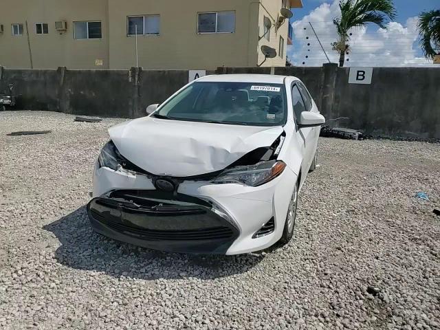 2018 Toyota Corolla L VIN: 5YFBURHE2JP753098 Lot: 69197014