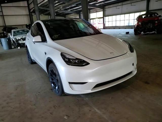 2023 Tesla Model Y VIN: 7SAYGAEE6PF770064 Lot: 65833024