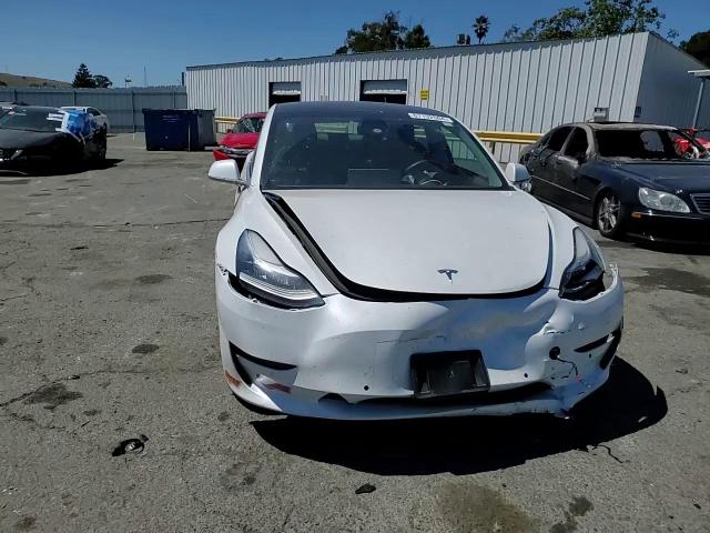 2020 Tesla Model 3 VIN: 5YJ3E1EB0LF618018 Lot: 67132504