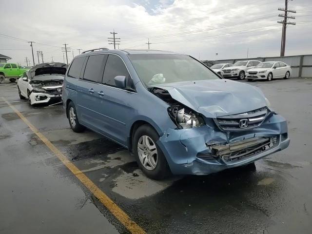 2007 Honda Odyssey Exl VIN: 5FNRL38767B107521 Lot: 70150635