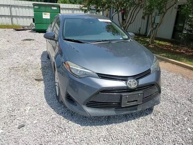 2018 Toyota Corolla L VIN: 5YFBURHE9JP748075 Lot: 67520535