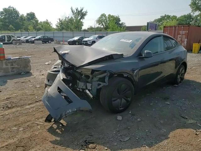 2026 Tesla Model Y VIN: 7SAYGDEE2TF332590 Lot: 67914265