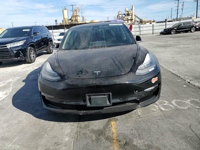 2020 Tesla Model 3 VIN: 5YJ3E1EAXLF657349 Lot: 68219305