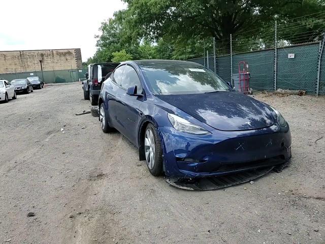 2022 Tesla Model Y VIN: 7SAYGAEE0NF519750 Lot: 67638055