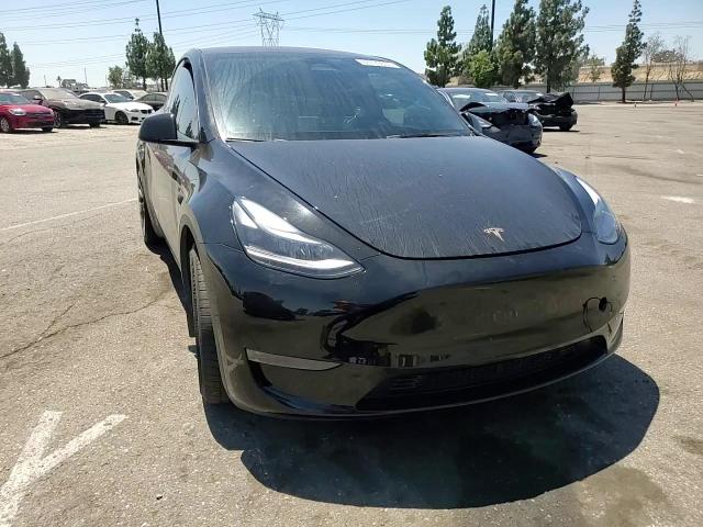 2023 Tesla Model Y VIN: 7SAYGDEF3PF978879 Lot: 67779005