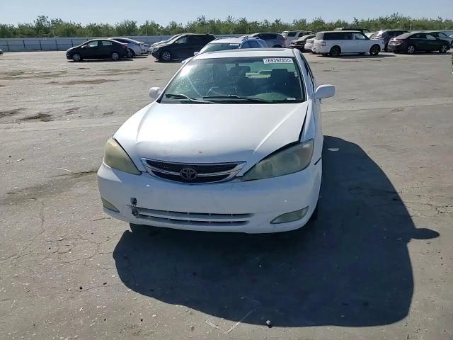 2004 Toyota Camry Le VIN: JTDBE32K140263114 Lot: 69392655
