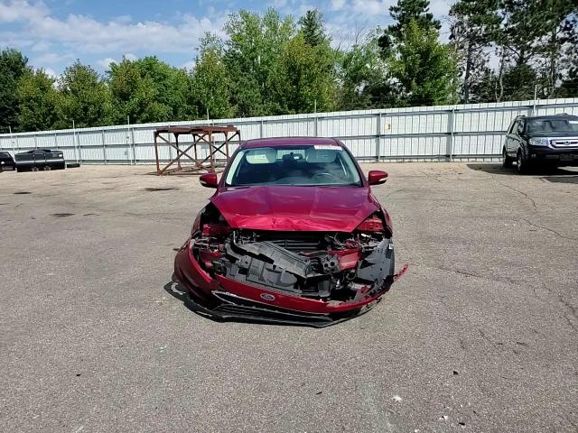 2015 Ford Focus Se VIN: 1FADP3F20FL208738 Lot: 70934175