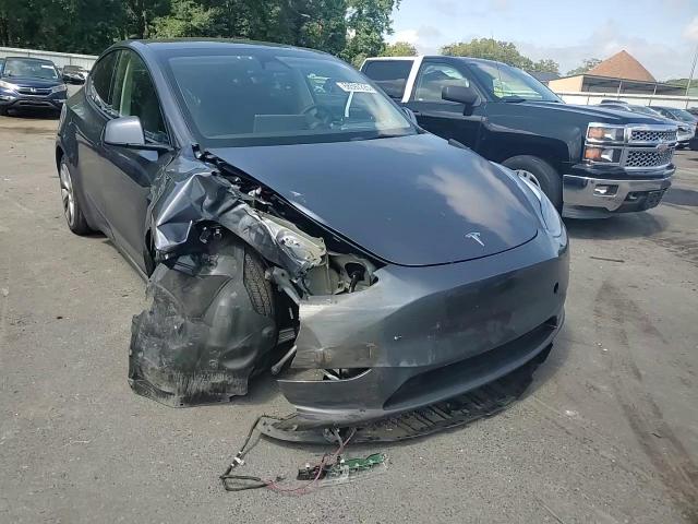2023 Tesla Model Y VIN: 7SAYGDEE2PF797859 Lot: 68597225