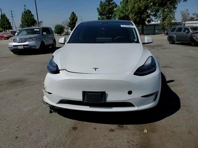 2021 Tesla Model Y VIN: 5YJYGDED5MF107750 Lot: 67389625