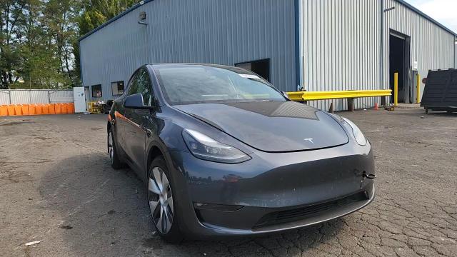 2023 Tesla Model Y VIN: 7SAYGDEE2PF620888 Lot: 70499035