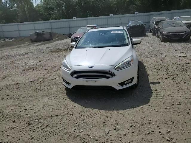 2017 Ford Focus Titanium VIN: 1FADP3J26HL331812 Lot: 67916645