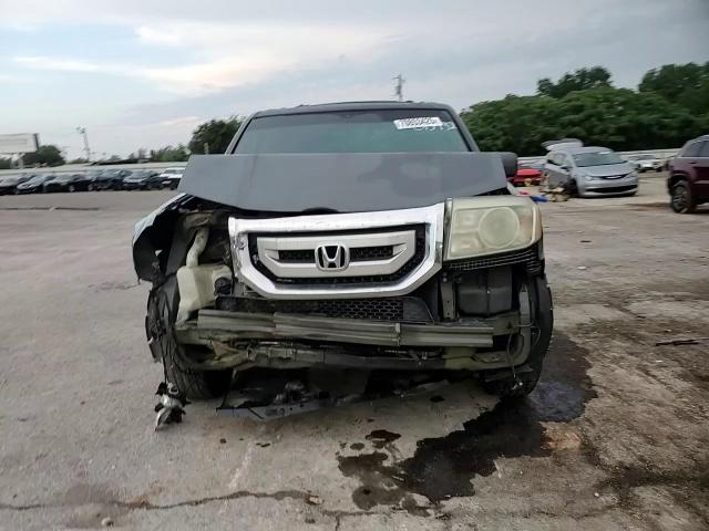 2011 Honda Pilot Exl VIN: 5FNYF3H55BB013432 Lot: 70853425