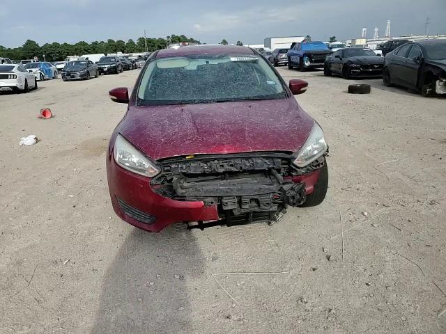 2016 Ford Focus Se VIN: 1FADP3F27GL393582 Lot: 70011675