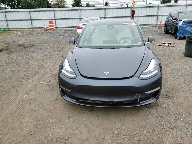 2019 Tesla Model 3 VIN: 5YJ3E1EB7KF390775 Lot: 67252265