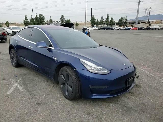 2018 Tesla Model 3 VIN: 5YJ3E1EA1JF003028 Lot: 70725325