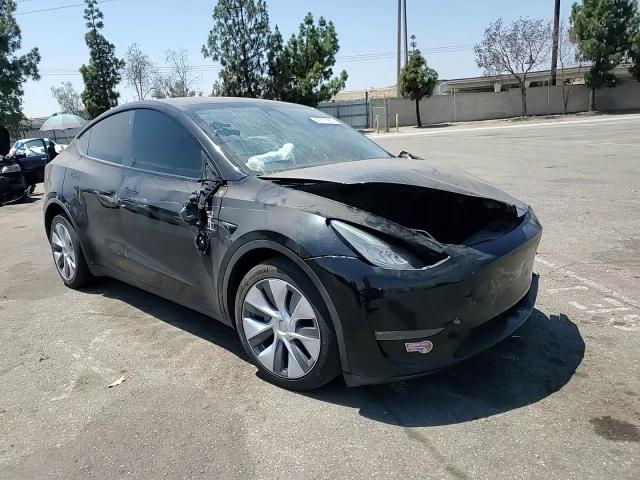 2023 Tesla Model Y VIN: 7SAYGDEEXPA087573 Lot: 68517905
