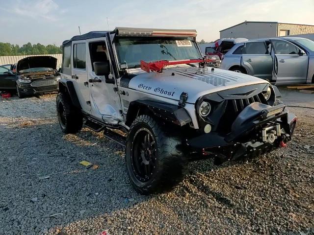 2012 Jeep Wrangler Unlimited Sport VIN: 1C4BJWDG6CL201744 Lot: 67629005