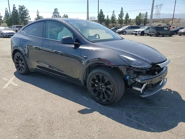 2024 Tesla Model Y VIN: 7SAYGAEE4RF010802 Lot: 66964725
