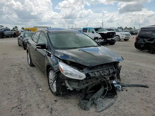 2015 Ford Focus Titanium VIN: 1FADP3J28FL386663 Lot: 68867985